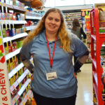 Alyssa stands in the candy aisle at Walgreens