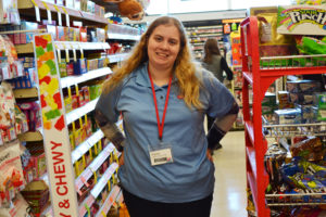 Alyssa stands in the candy aisle at Walgreens