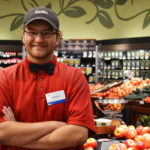 Josh pictured in the produce department of a grocery store