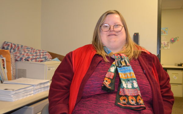 Erin sits at her desk in her office at the City of Columbia