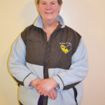 Frances poses in her work jacket