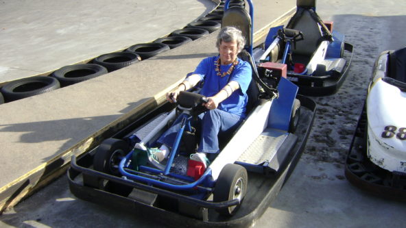 woman sits in go-kart