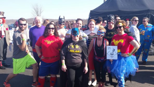 Group of people in costumes getting ready for Polar Plunge event.