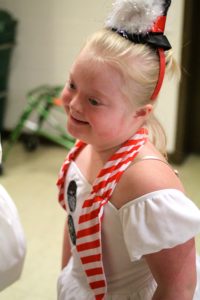 Olive in snowman costume gets ready to perform