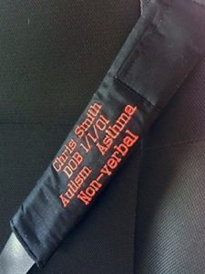 photo of embroidered seat belt covers