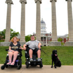 Lindsey, Colton and Casey pose for a picture in front of the iconic columns at the University of Missouri.