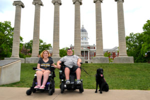 Lindsey, Colton and Casey pose for a picture in front of the iconic columns at the University of Missouri.