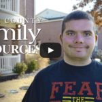 Smiling young man wearing UMSL t-shirt.