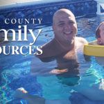 Young man with cerebral palsy enjoys floating in pool with family.