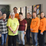 Coworkers posing for photo