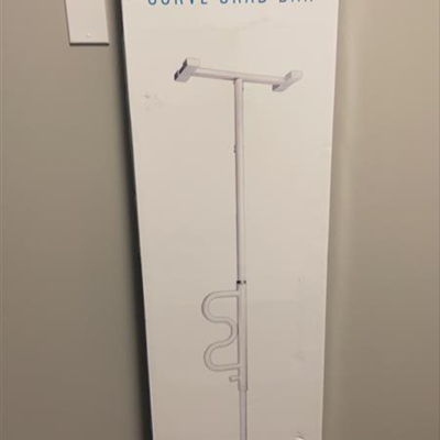 security tension pole with curved grab bar for standing assist