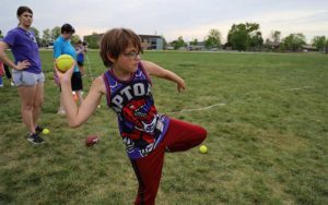 Finn rears back preparing to make an extraordinary throw. 