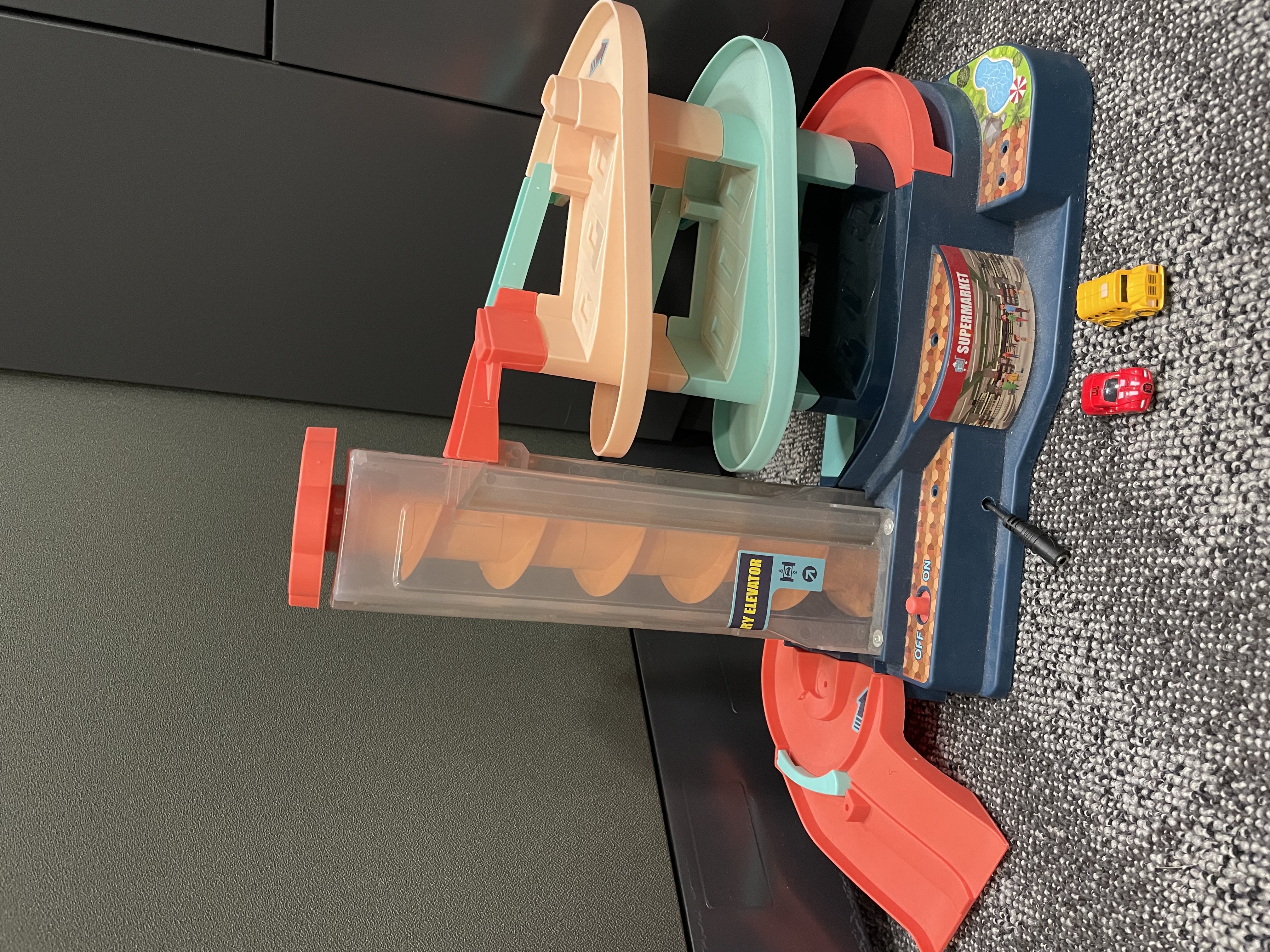 Car garage playset converted to a switch toy