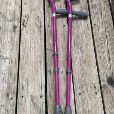 Set of pink forearm crutches children's mobility aid
