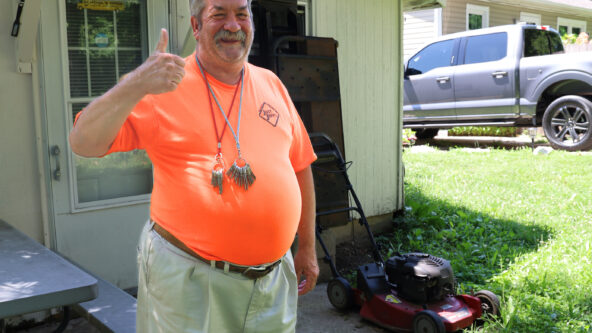 Steve giving a thumbs up after the renovations in the back of his house.